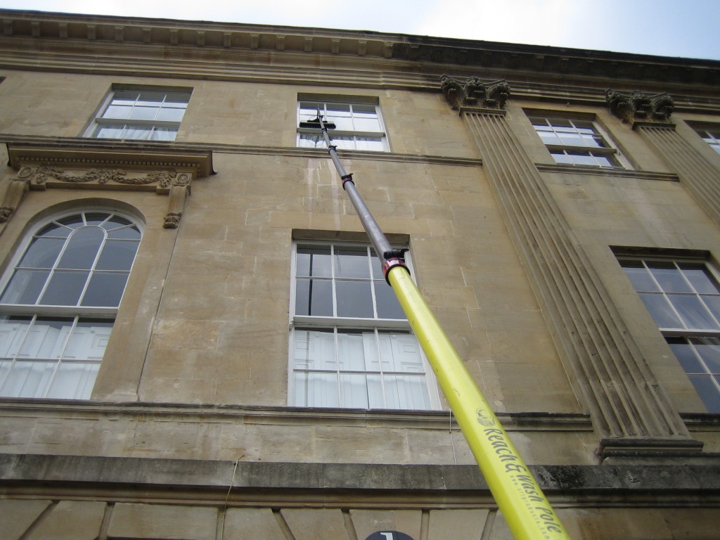 Clean and bright windows cleaning a special feature window on a Bath property