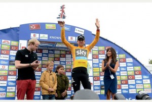 Sir Bradley Wiggins celebrates after taking the lead in The Tour of Britain and the gold jersey, during the Stage Three Individual Time Trial in the 2013 Tour of Britain in Knowsley.